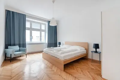 Ein Bett oder Betten in einem Zimmer der Unterkunft UNIVERSUM APARTMENT 2