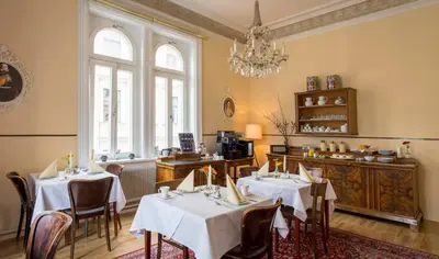 Ein Restaurant oder anderes Speiselokal in der Unterkunft Boutique Hotel Columbia