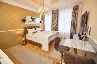 Ein Bett oder Betten in einem Zimmer der Unterkunft Sophies Place Augarten - Imperial Lifestyle City Apartments Vienna Parking
