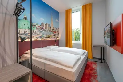 Ein Bett oder Betten in einem Zimmer der Unterkunft Campanile Vienna South