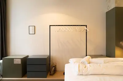 Ein Bett oder Betten in einem Zimmer der Unterkunft grätzlhotel beim Belvedere