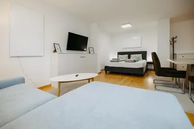 Ein Bett oder Betten in einem Zimmer der Unterkunft Ferienwohnung Dado