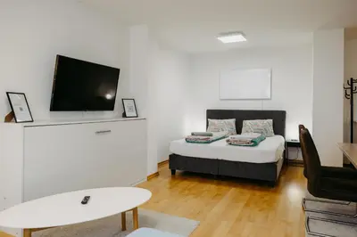 Ein Bett oder Betten in einem Zimmer der Unterkunft Ferienwohnung Dado