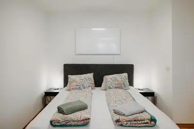 Ein Bett oder Betten in einem Zimmer der Unterkunft Ferienwohnung Dado