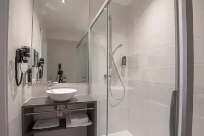 Ein Badezimmer in der Unterkunft Wilmas Apartments by Arbio