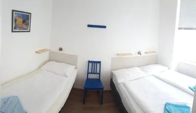Ein Bett oder Betten in einem Zimmer der Unterkunft Sobieski Town Apartments