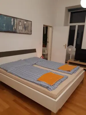 Ein Bett oder Betten in einem Zimmer der Unterkunft Apartment Dahlia Vienna