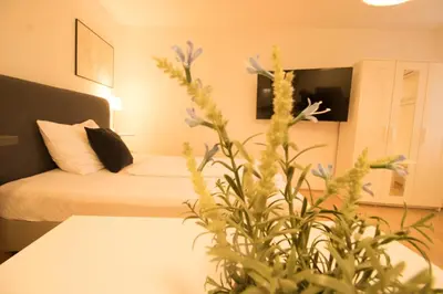 Ein Bett oder Betten in einem Zimmer der Unterkunft Der Gemütliche Ort l LF41