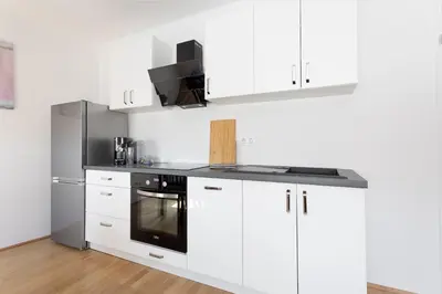 Küche/Küchenzeile in der Unterkunft Skyline Aussicht l LF46