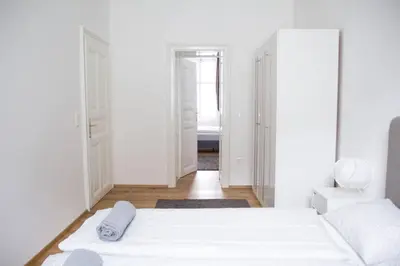 Ein Bett oder Betten in einem Zimmer der Unterkunft josef's home I Kaiserzeit Residence I 01