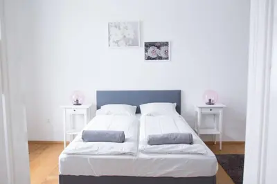 Ein Bett oder Betten in einem Zimmer der Unterkunft josef's home I Kaiserzeit Residence I 01