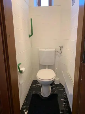 Ein Badezimmer in der Unterkunft Apartment Ariana