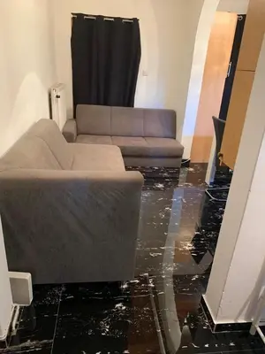 Ein Sitzbereich in der Unterkunft Apartment Ariana
