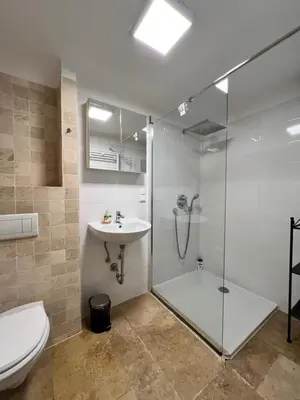 Ein Badezimmer in der Unterkunft REMA Apartments 1090