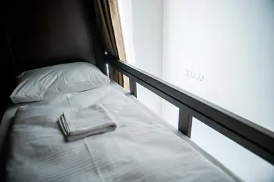 Ein Bett oder Betten in einem Zimmer der Unterkunft Vienna Boutique - Premium Hostel