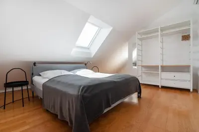 Ein Bett oder Betten in einem Zimmer der Unterkunft Vienna Roof Top Apartment with Terrace, Parking and AC