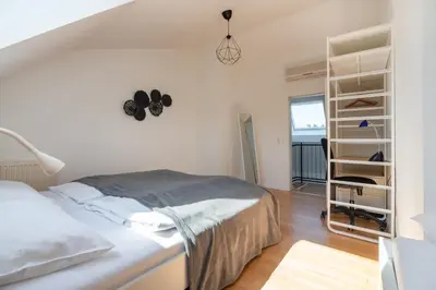 Ein Bett oder Betten in einem Zimmer der Unterkunft Vienna Roof Top Apartment with Terrace, Parking and AC
