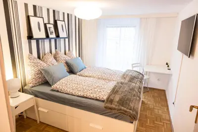 Ein Bett oder Betten in einem Zimmer der Unterkunft Your Cozy Home * 12 min to City Center