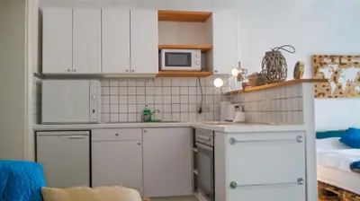 Küche/Küchenzeile in der Unterkunft Elegant 1BR Apartment 3 Min from Rennweg Station