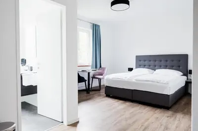 Ein Bett oder Betten in einem Zimmer der Unterkunft Müllner Smart Hotel Wien Self Check In
