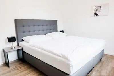 Ein Bett oder Betten in einem Zimmer der Unterkunft Müllner Smart Hotel Wien Self Check In