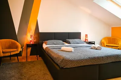 Ein Bett oder Betten in einem Zimmer der Unterkunft Modern Suite City Center
