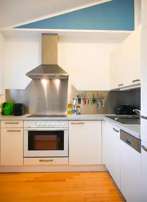 Küche/Küchenzeile in der Unterkunft Modern Suite City Center