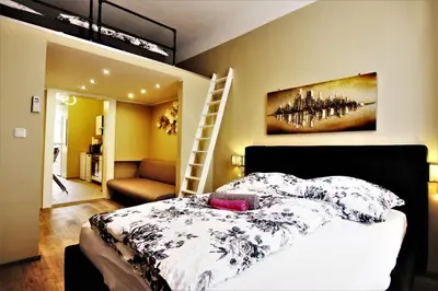 Ein Bett oder Betten in einem Zimmer der Unterkunft Boutique Apartments Vienna - Design 5