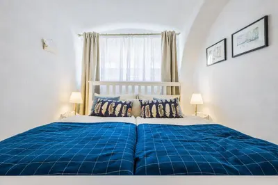 Ein Bett oder Betten in einem Zimmer der Unterkunft Wohnatelier im Bioweingut