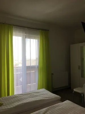 Ein Bett oder Betten in einem Zimmer der Unterkunft Pension Seeblick Latzko