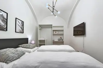 Ein Bett oder Betten in einem Zimmer der Unterkunft Vienne City Apartment Crown 6