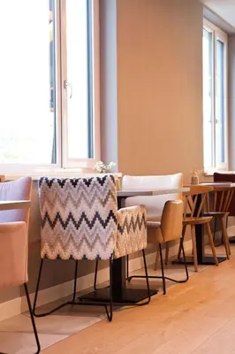 Ein Sitzbereich in der Unterkunft Hampton By Hilton Vienna Messe