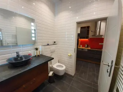 Ein Badezimmer in der Unterkunft Design-Apartment mit Klimaanlage & Top-Anbindung an der U1