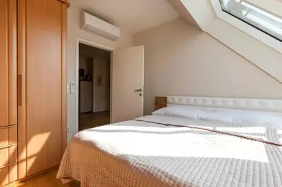 Ein Bett oder Betten in einem Zimmer der Unterkunft Großes Penthouse #12 mit Terrasse und Aussicht