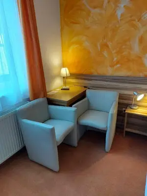 Ein Sitzbereich in der Unterkunft Pension Claudia