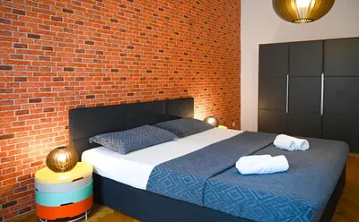 Ein Bett oder Betten in einem Zimmer der Unterkunft Elegant Suite Augarten