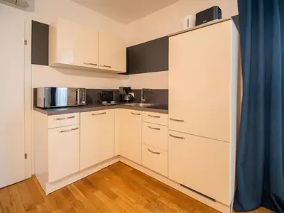 Küche/Küchenzeile in der Unterkunft Elegant Apartment Naschmarkt