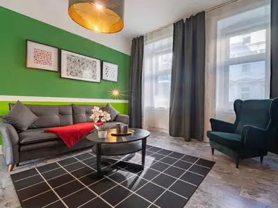 Ein Sitzbereich in der Unterkunft Stylish Apartment for 6 near Vienna International Centre Metro U1