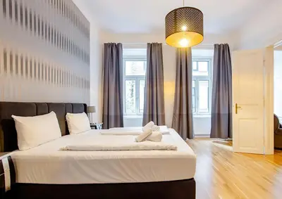 Ein Bett oder Betten in einem Zimmer der Unterkunft Exclusive Apartment City Center