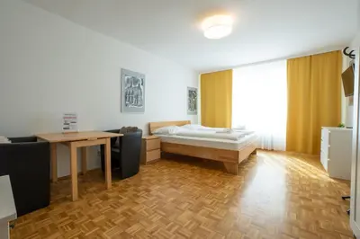 Ein Bett oder Betten in einem Zimmer der Unterkunft Central living - Stephansdom Apartments