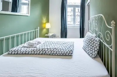 Ein Bett oder Betten in einem Zimmer der Unterkunft Viennese charm 2.0 by JR City Apartments
