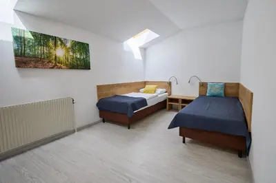 Ein Bett oder Betten in einem Zimmer der Unterkunft Tennis- und Freizeitzentrum Neudörfl