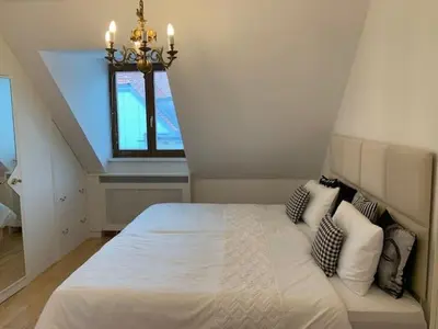 Ein Bett oder Betten in einem Zimmer der Unterkunft Amadeus Apartment