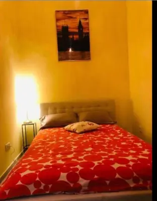 Ein Bett oder Betten in einem Zimmer der Unterkunft The Beautiful Italian Suit