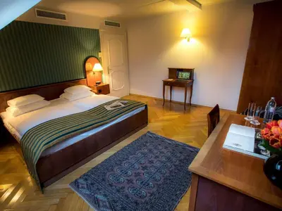 Ein Bett oder Betten in einem Zimmer der Unterkunft Mercure Grand Hotel Biedermeier Wien