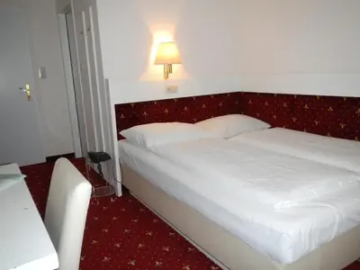 Ein Bett oder Betten in einem Zimmer der Unterkunft Pension Pharmador
