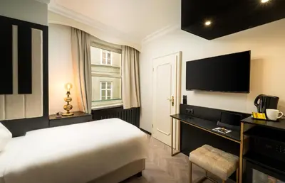 Ein Bett oder Betten in einem Zimmer der Unterkunft elaya hotel vienna city center, Trademark by Wyndham