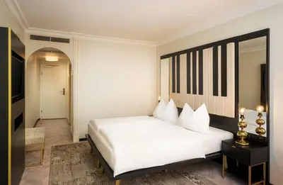 Ein Bett oder Betten in einem Zimmer der Unterkunft elaya hotel vienna city center, Trademark by Wyndham