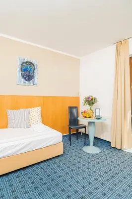 Ein Bett oder Betten in einem Zimmer der Unterkunft Art Hotel Vienna