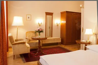 Ein Bett oder Betten in einem Zimmer der Unterkunft Hotel Kaiserin Elisabeth